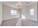 Spacious bedroom with new carpet and large windows at 37057 Still Rock Pt, Elizabeth, CO 80107