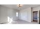 Well-lit bedroom with a closet and carpet floors at 37057 Still Rock Pt, Elizabeth, CO 80107