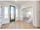 Bright entryway with wood floors and view from front door at 37057 Still Rock Pt, Elizabeth, CO 80107