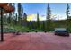 Relaxing patio area with hot tub and fire pit, mountain views at 133 Adams Way, Breckenridge, CO 80424