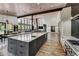 Modern kitchen with large island and high-end appliances at 133 Adams Way, Breckenridge, CO 80424