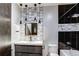 Contemporary bathroom with black and white tile and floating vanity at 133 Adams Way, Breckenridge, CO 80424