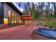 Spacious backyard with hot tub, fire pit, and mountain views at 133 Adams Way, Breckenridge, CO 80424