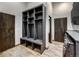 Laundry room with built-in shelving and modern washer/dryer at 133 Adams Way, Breckenridge, CO 80424