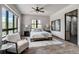 Main bedroom with plush carpet and large windows offering mountain views at 133 Adams Way, Breckenridge, CO 80424