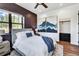 Bright bedroom with a queen-size bed and built-in closet at 133 Adams Way, Breckenridge, CO 80424