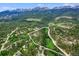 Mountain lot with surrounding homes and mountain views at 133 Adams Way, Breckenridge, CO 80424