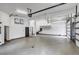 Large garage with high ceilings and epoxy flooring at 133 Adams Way, Breckenridge, CO 80424