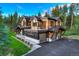 Luxury home with a three-car garage and expansive landscaping at 72 Dyer Trl, Breckenridge, CO 80424