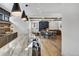 Open bar with a large marble countertop and seating at 72 Dyer Trl, Breckenridge, CO 80424
