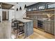 Stylish bar area with sleek cabinetry and stone countertops at 72 Dyer Trl, Breckenridge, CO 80424