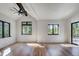 Spacious bedroom with hardwood floors and access to a balcony at 72 Dyer Trl, Breckenridge, CO 80424