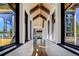 Elegant hallway with hardwood floors and wood-beamed ceiling at 72 Dyer Trl, Breckenridge, CO 80424