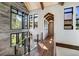 Bright hallway with hardwood floors and large windows at 72 Dyer Trl, Breckenridge, CO 80424
