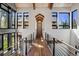 Sunlit hallway featuring hardwood floors and high ceilings at 72 Dyer Trl, Breckenridge, CO 80424