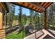 Deck overlooking scenic mountain views and wooded area at 72 Dyer Trl, Breckenridge, CO 80424