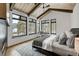 King bedroom with mountain views and a fireplace at 72 Dyer Trl, Breckenridge, CO 80424