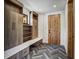 Modern mudroom with built-in cabinets and bench at 72 Dyer Trl, Breckenridge, CO 80424
