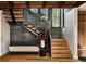 Modern staircase with wood and metal accents at 72 Dyer Trl, Breckenridge, CO 80424