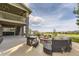 Relaxing patio with fire pit and seating area at 7892 S Country Club Pkwy, Aurora, CO 80016