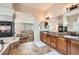 Luxurious bathroom with double vanity and a view of the bedroom at 7892 S Country Club Pkwy, Aurora, CO 80016