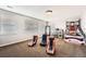 Fun game room with gaming chairs and basketball hoop at 7892 S Country Club Pkwy, Aurora, CO 80016