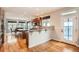 Eat-in kitchen with access to deck at 7892 S Country Club Pkwy, Aurora, CO 80016