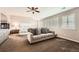 Spacious main bedroom with a sitting area and fireplace at 7892 S Country Club Pkwy, Aurora, CO 80016