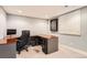 Basement office with a large desk and window at 7892 S Country Club Pkwy, Aurora, CO 80016