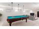 Finished basement recreation area with a pool table and comfortable seating at 4756 E Pinewood Cir, Centennial, CO 80121