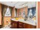 Stylish bathroom with a large vanity and vessel sink at 4756 E Pinewood Cir, Centennial, CO 80121