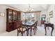 Bright dining room featuring a formal table and hutch at 4756 E Pinewood Cir, Centennial, CO 80121