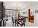Formal dining room with view into kitchen at 4756 E Pinewood Cir, Centennial, CO 80121