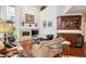 Gathering room with fireplace and built-in wet bar at 4756 E Pinewood Cir, Centennial, CO 80121