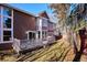 House exterior showcasing brown siding and deck at 4756 E Pinewood Cir, Centennial, CO 80121