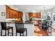 Kitchen features breakfast bar and ample cabinetry at 4756 E Pinewood Cir, Centennial, CO 80121