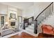 Spacious living room with a fireplace and hardwood floors at 4756 E Pinewood Cir, Centennial, CO 80121