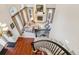 Living room with hardwood floors and a fireplace, seen from above at 4756 E Pinewood Cir, Centennial, CO 80121