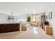 Spacious loft area with sitting area and built-in cabinetry at 4756 E Pinewood Cir, Centennial, CO 80121