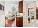 Home office with built-in shelving and hardwood floors at 4756 E Pinewood Cir, Centennial, CO 80121