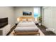 Comfortable basement bedroom with a TV and plenty of closet space at 1059 S Saulsbury St, Lakewood, CO 80226