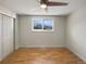 Spacious bedroom with hardwood floors and ceiling fan at 1059 S Saulsbury St, Lakewood, CO 80226