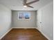 Bright bedroom with hardwood floors and ceiling fan at 1059 S Saulsbury St, Lakewood, CO 80226