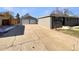 Two-car attached garage with new white doors at 1059 S Saulsbury St, Lakewood, CO 80226