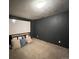 Basement room with projector screen and storage at 15503 E Princeton Ave, Aurora, CO 80013