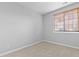 Simple bedroom with neutral walls and carpet at 22580 E Ontario Dr # 103, Aurora, CO 80016