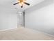 Bright bedroom with neutral walls and carpeting, plus a ceiling fan at 22580 E Ontario Dr # 103, Aurora, CO 80016