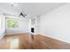 Living room featuring hardwood floors and a fireplace at 22580 E Ontario Dr # 103, Aurora, CO 80016