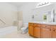 Full bathroom with wood vanity and shower/tub at 22580 E Ontario Dr # 103, Aurora, CO 80016