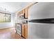Well-equipped kitchen featuring modern appliances and ample cabinet space at 22580 E Ontario Dr # 103, Aurora, CO 80016